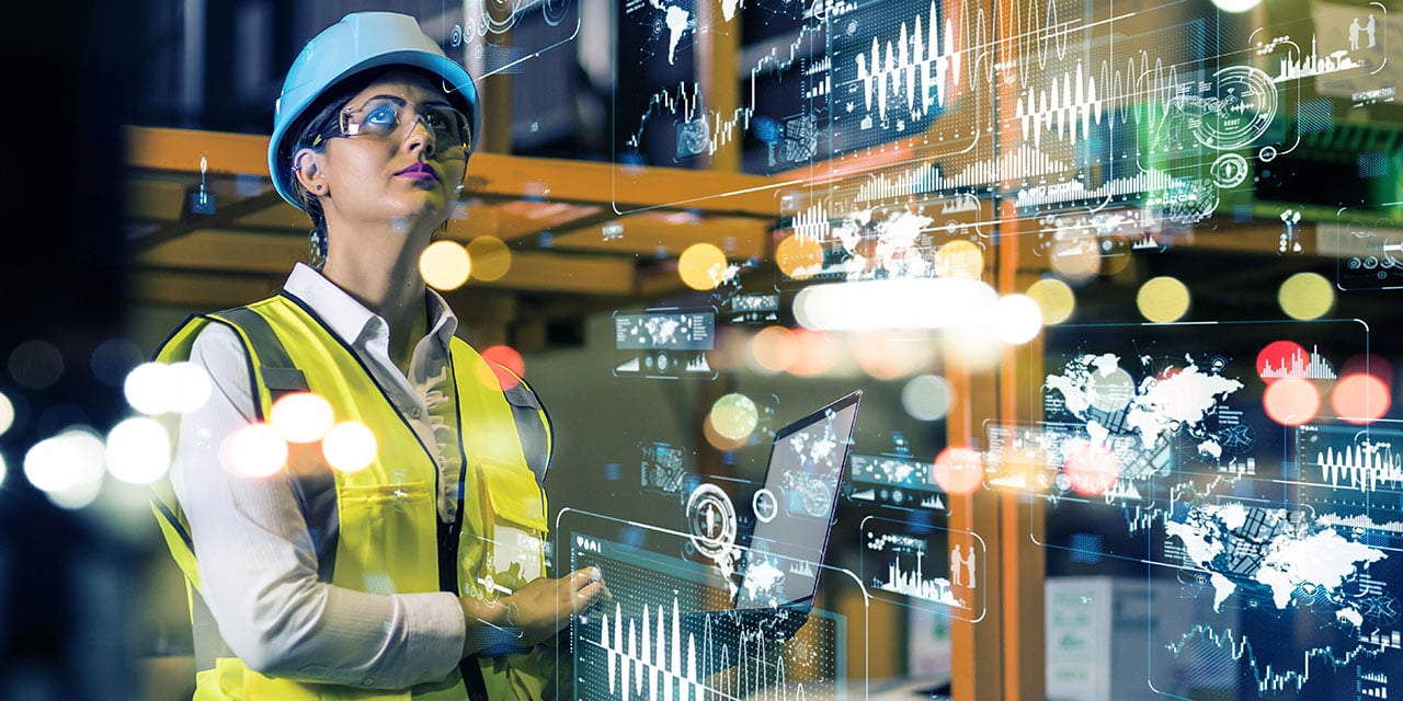 Woman conducting a safety inspection in a factory.